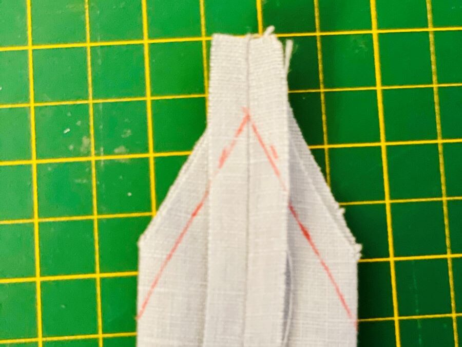 Fabric in the shape of a v