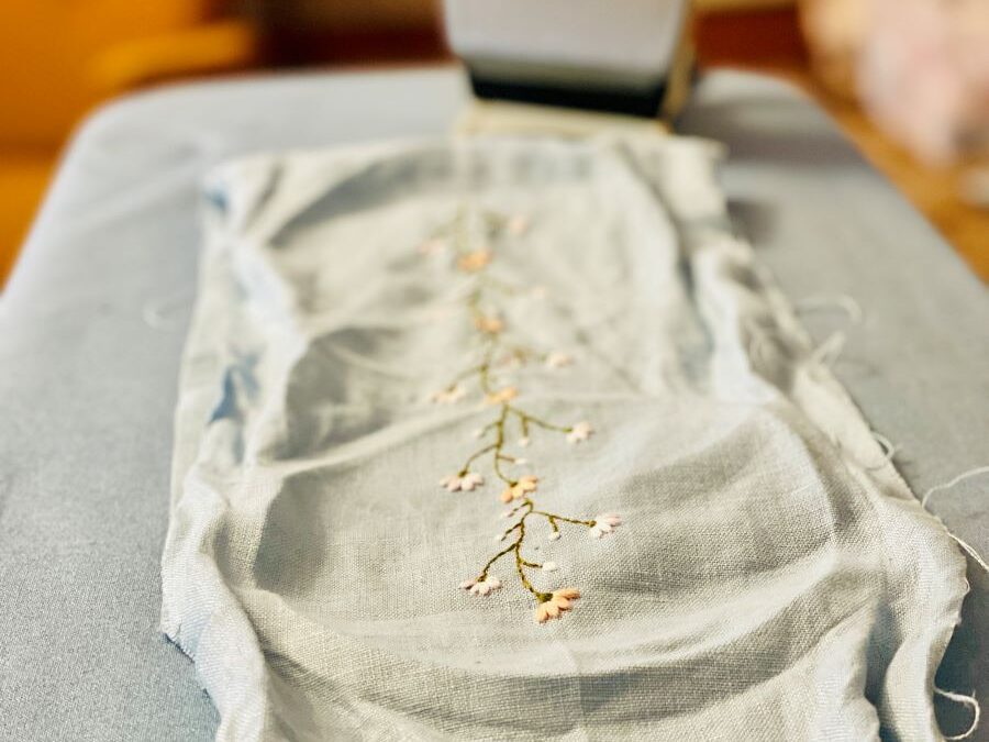 How to make a simple embroidered headband - finished piece of embroidery work waiting to be ironed