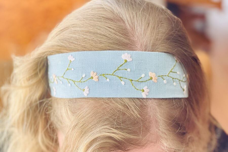How to make a simple embroidered headband - floral embroidered headband on a head