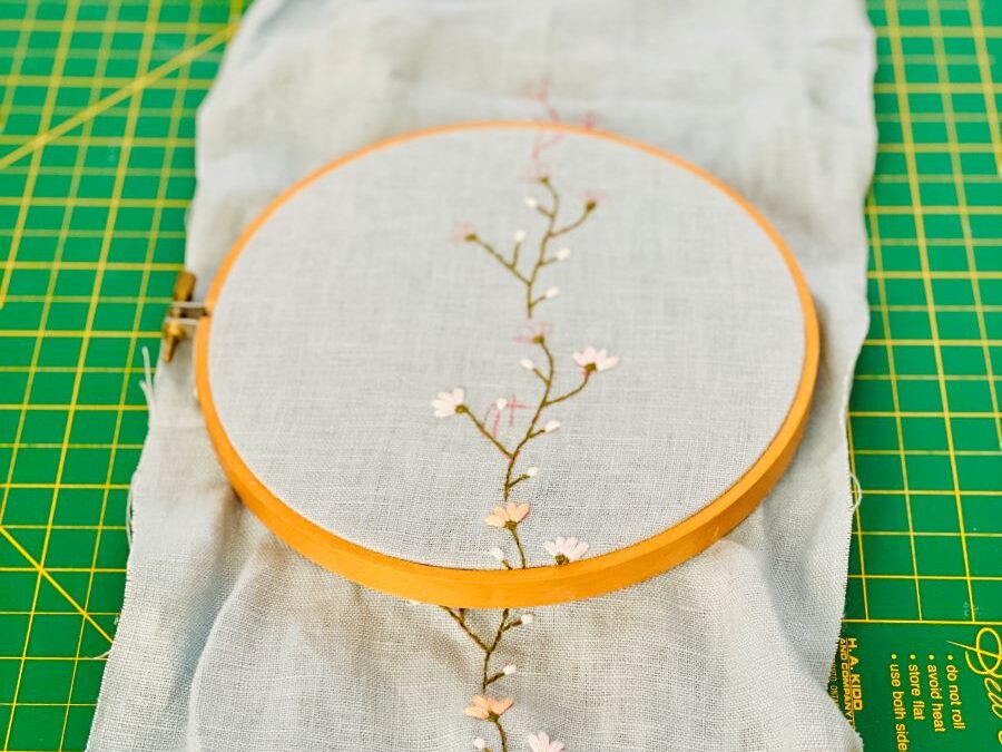 How to make a simple embroidered headband - partly finished embroidered headband inside a hoop